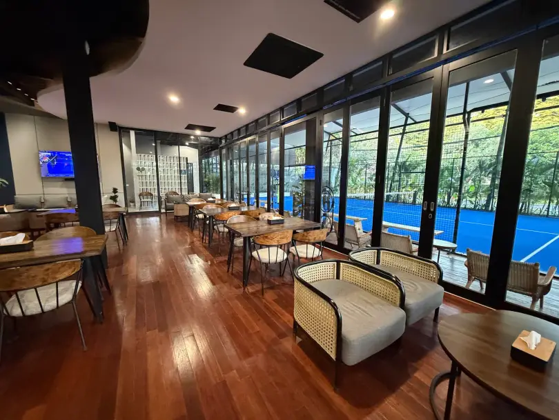Double Coffee & Kitchen dining room with windows onto the courts