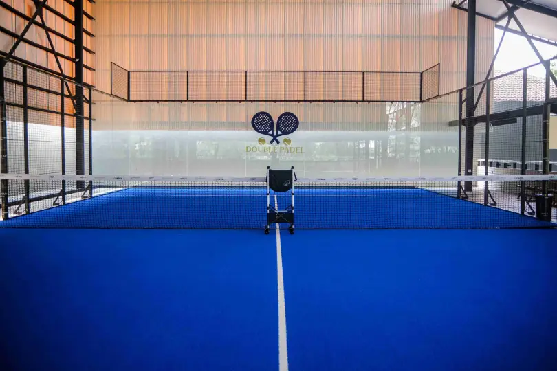 Court with the Double Padel crest on the back wall